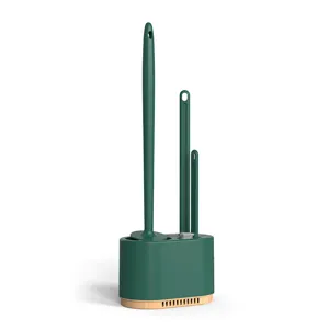 Green toilet brush set with three cleaning pieces and holder for bathroom cleaning.