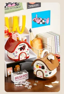 Jolie tirelire en forme de maison pour enfants, boîte de rangement de pièces et jouet de bureau.