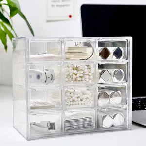 Tiroir organisateur de bureau en plastique transparent à 12 grilles pour cosmétiques et papeterie.