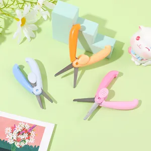 Retractable mini scissors set for kids art, student DIY craft, and portable office stationery use.