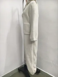 White hooded fleece jumpsuit detailed view, cozy winter loungewear with front pockets.