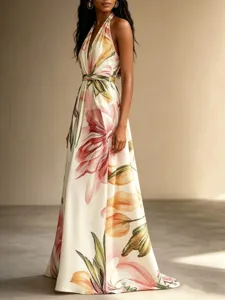 Detailed view of the elegant floral halter maxi dress featuring a chic backless design.
