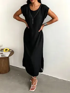 Sleeveless black midi dress for women featuring side slit and loose casual vest design.