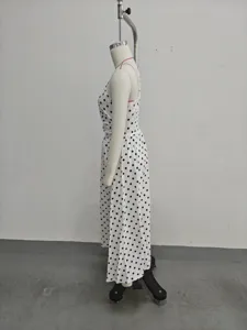 French polka dot halter dress side view detail showing the elegant A-line long dress style.
