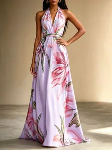 Elegant floral halter long dress with backless design and graceful swing hem for summer.