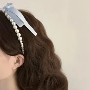 Elegant French style pearl headband with a light blue ribbon bow for sweet women