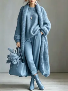 Élégant long manteau en cachemire bleu pour femme dans un style d'automne décontracté