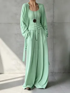 Elegante completo tre pezzi verde menta con cardigan lungo e pantaloni a gamba larga fluidi