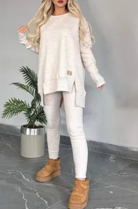 Detail view of casual autumn winter women solid color thermal lounge set with side split.