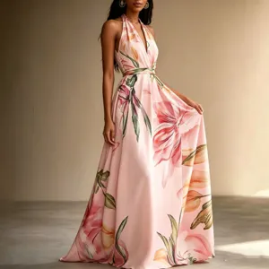 Detail shot of the elegant floral halter neck long dress showing backless resort style details.
