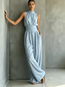 Solid color sleeveless high neck wide leg jumpsuit for women, casual chic summer long pants.