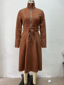 Brown suede midi dress featuring a stand collar, full front zip, and waist tie belt.