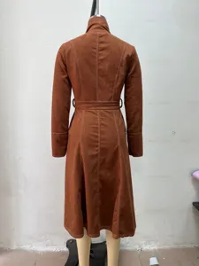 Vintage brown suede long dress with contrast white stitching, belt, and elegant stand collar back.