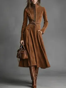 Detail shot of the elegant brown suede long sleeve dress with zipper and waist belt.