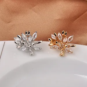Elegantes broches en forma de árbol con cristales de marquise en tonos oro y plata
