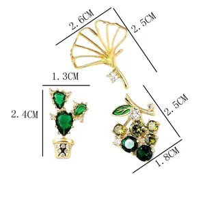 Detailed dimensions of ginkgo leaf, cactus, and grape crystal plant brooches
