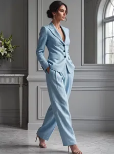 Light blue women suit detail view, elegant two piece blazer and trousers set for professional daily wear.