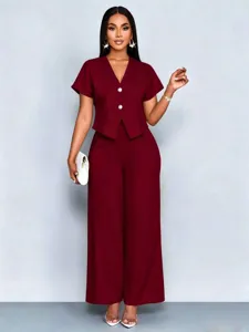 Casual summer two-piece set with short sleeve V-neck cardigan and wide-leg pants.
