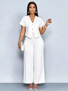 Plus size casual white two-piece set featuring short sleeve V-neck top and wide leg pants.
