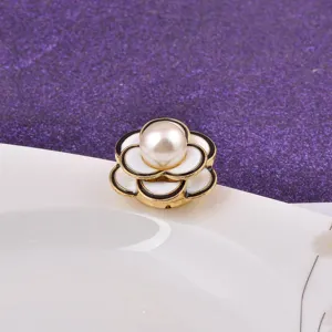 Elegant magnetic camellia flower brooch with faux pearl for clothing decoration.