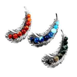Elegant feather-shaped brooches set with colorful natural stones for coats.