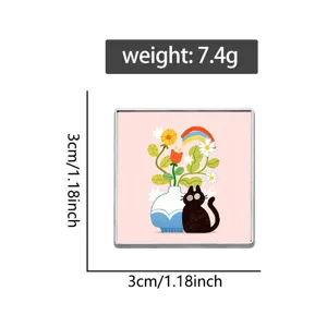 Square enamel pin badge featuring a black cat and floral illustration on a pink background.