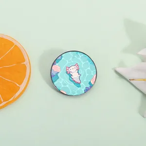 Broche axolotl mignonne design vert menthe avec coraux roses pour enfants style cartoon