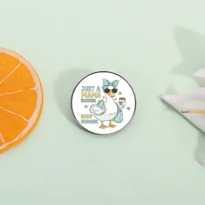 Round cartoon duck brooch with Just A Mama Raising Good Humans quote for mothers