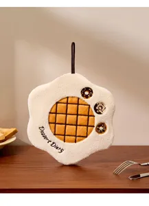 Hanging coral fleece hand towel featuring cute waffle and donut embroidery design detail.