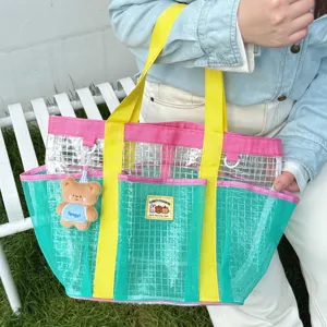 Dopamine colorblock mesh beach bag, large capacity travel tote with cute bear pendant.