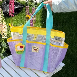 Colorful dopamine mesh beach bag with large capacity, cute pendant and durable straps.