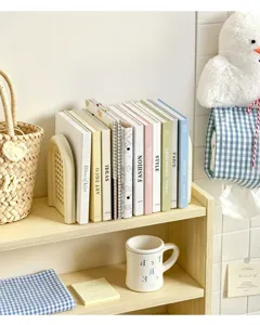 Minimalist desktop bookend rack and storage organizer for student desk and office stationery.
