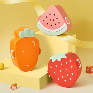 Cute fruit-shaped bento lunch box with compartments, portable container for students and office workers.