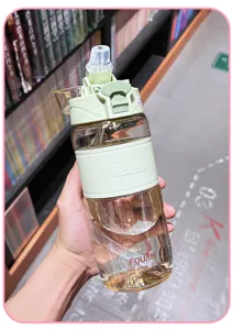 Portable 630ml plastic sports water bottle with straw and capacity scale for outdoor fitness.