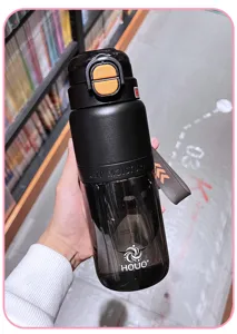 Portable large capacity sports water bottle with strap and straw for students and daily outdoor use.