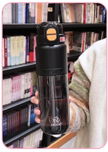 Detailed shot of a large-capacity portable sports water bottle with straw and dual-drink lid.