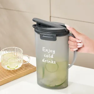 Large capacity frosted cold water pitcher with press lid and 2000ml volume for summer drinks.