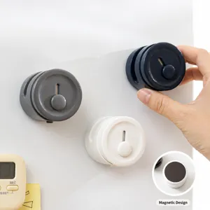 Portable mini magnetic bag sealer for kitchen food storage, compact and easy to use.