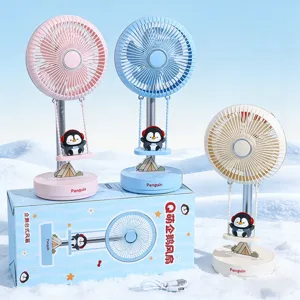 Detalle de ventilador de escritorio USB pingüino tierno, pequeño ventilador portátil recargable.