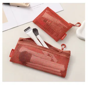 Red mesh cosmetic bags with zipper and hanging buckle, showing detailed close-up display.