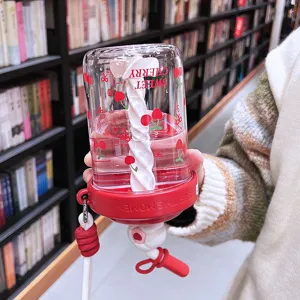 Cute cherry print water bottle with straw and portable hand strap for daily office use.