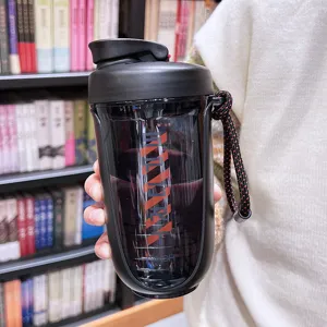 Black plastic shaker bottle with carrying strap for protein shakes, fitness and gym workouts.