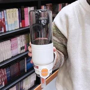 Large capacity sports water bottle with straw and portable strap for students and daily use.