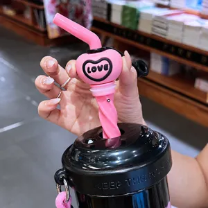 Portable stirring water bottle with cute heart straw, high aesthetic tumbler for daily use.