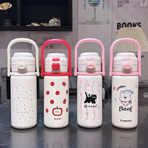 Cute dual-drink insulated water bottle for girls, portable straw cup with handle for students.