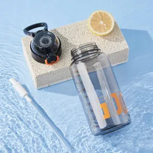 Large capacity plastic sports water bottle with straw and lid for outdoor activities.