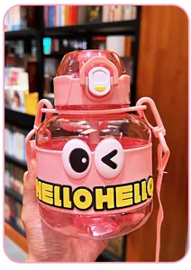 Cute pink water bottle with cartoon big eyes and straw, portable big belly cup for kids.