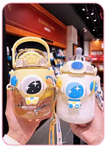 Cute astronaut kids water bottle with strap and straw, large capacity school cup for students.