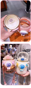 Kids astronaut water bottle with straw and strap, cute large capacity cup for school.