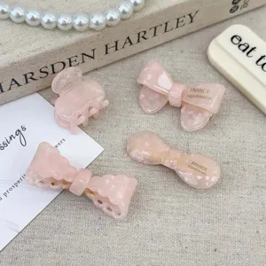 Rosa Acetat Schleife Haarklammern Set für Damen mit Perlen und Buch Dekor im Vintage Stil